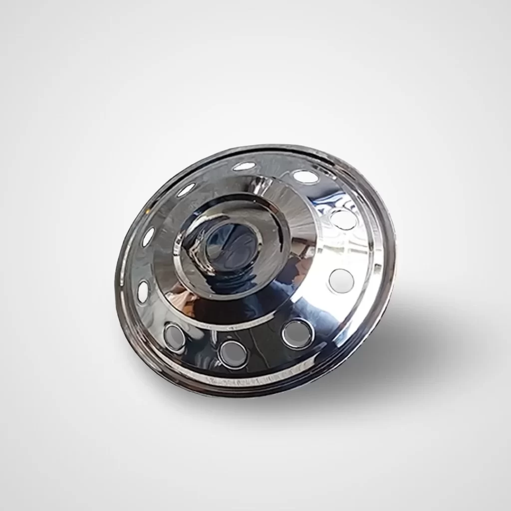 Front view of a highly polished 16-inch stainless steel hubcap with a reflective chrome-like finish. The surface is slightly domed, with concentric circular ridges and a central raised dome. A series of circular cut-outs runs along the outer edge, evenly spaced and symmetrical, offering a balance of style and ventilation.